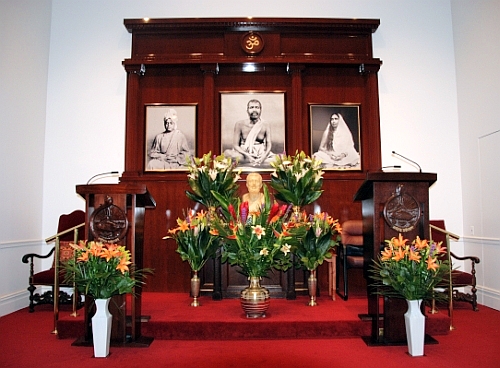 centered image of Altar to Sri Ramakrishna, Sri Sarada Devi, and Swami Vivekananda.