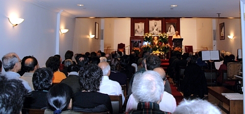 view of crowd surrounding altar.