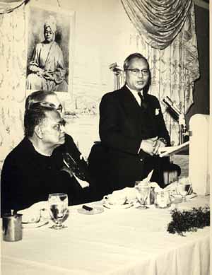 Secretary General U. Thant of the United Nations giving keynote address, (seated Swami Nikhilananda, Spiritual Leader of the Ramakrishna-Vivekananda Center of New York).