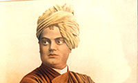 A painting of Swami Vivekananda in America. The portrait depics Swami Vivekananda with his arms crossed, looking to the left. Below him is his name in an ornate typeface.