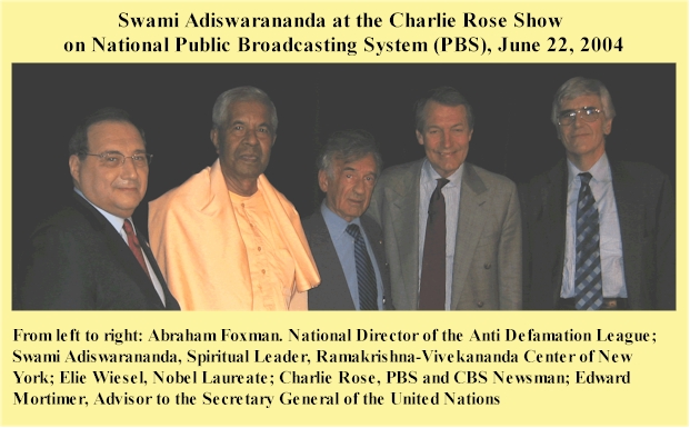 Swami Adiswarananda at the Charlie Rose Show with other speakers.